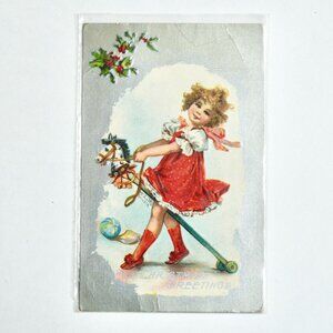 1910 Antique Christmas Postcard Greetings Curly Haired Girl on Toy Horse